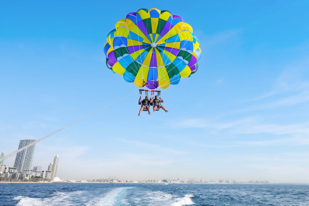Thrilling parasailing experience over Dubai with stunning views of the skyline and sea.